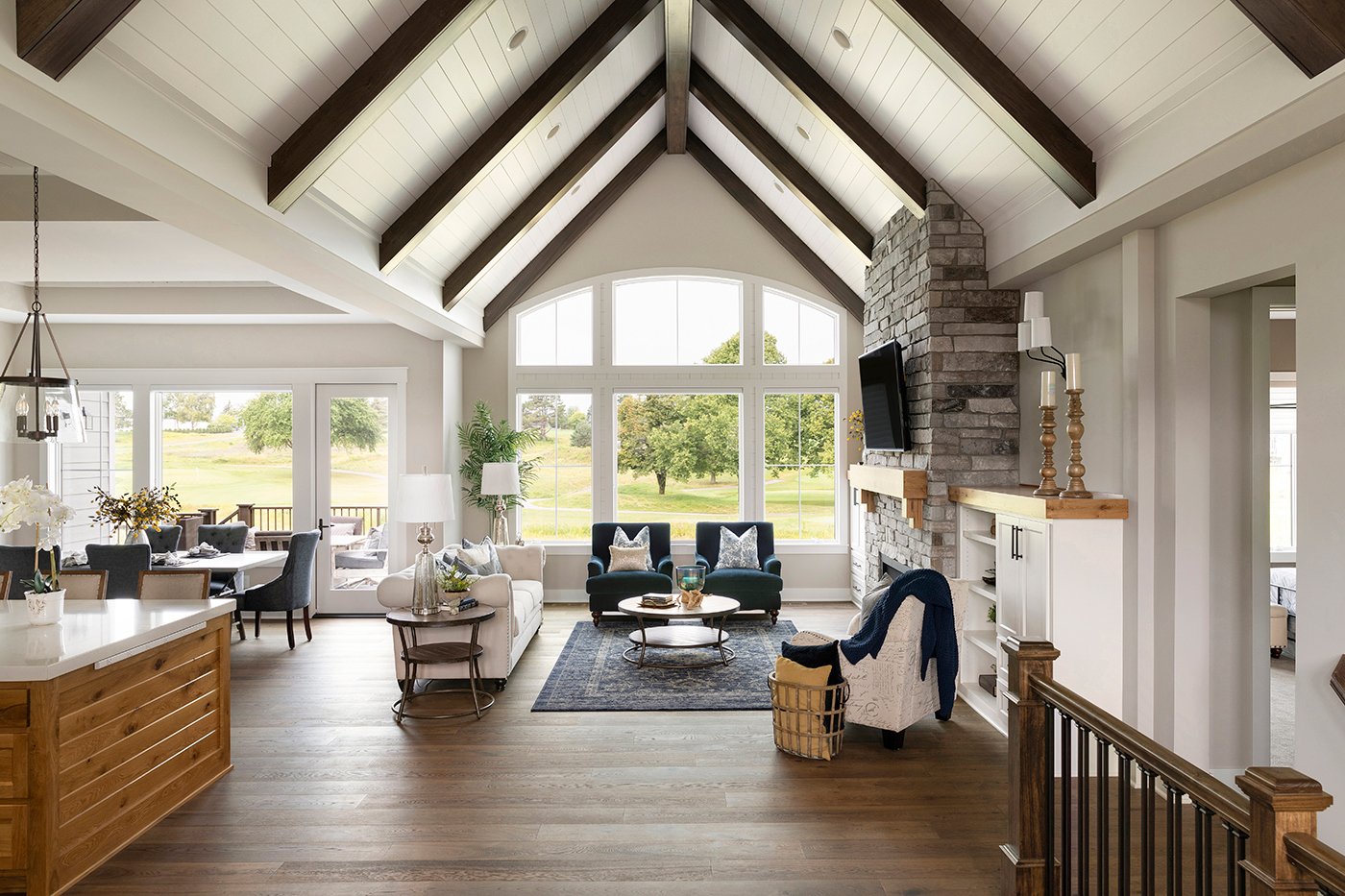 An open concept space that’s filled with light from Andersen® 400 Series Complementary Windows.