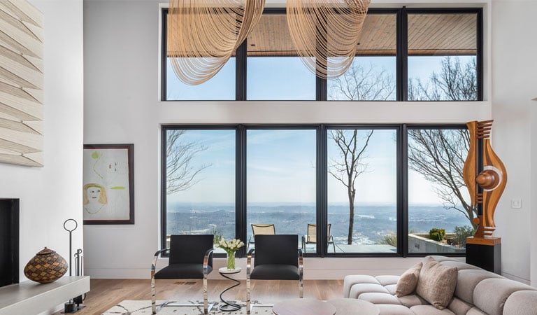 living room with black framed andersen 400 series windows