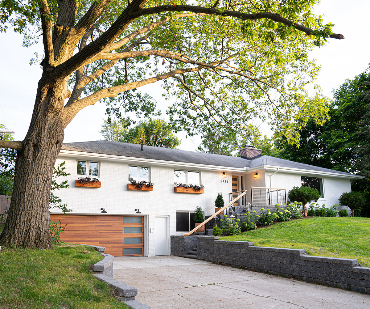A 1950s ranch home after window replacement and remodeling on the left and before on the right.