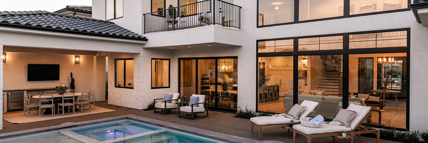 Modern Coastal Mediterranean home style. 100 Series casement, gliding, picture and transom windows; Black interiors & exteriors; Black hardware